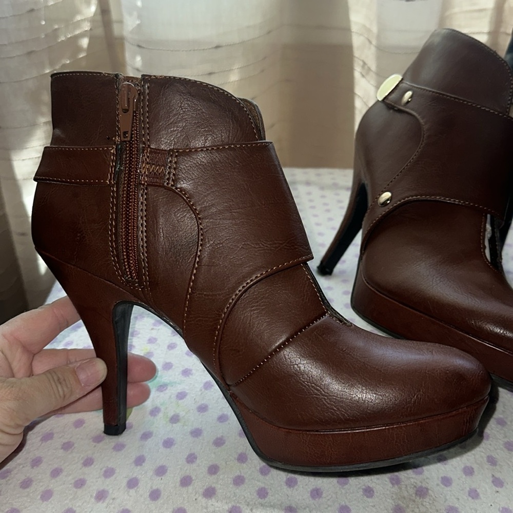 Shoe booties. Browns are new the blk worn once. Price is for both pairs.